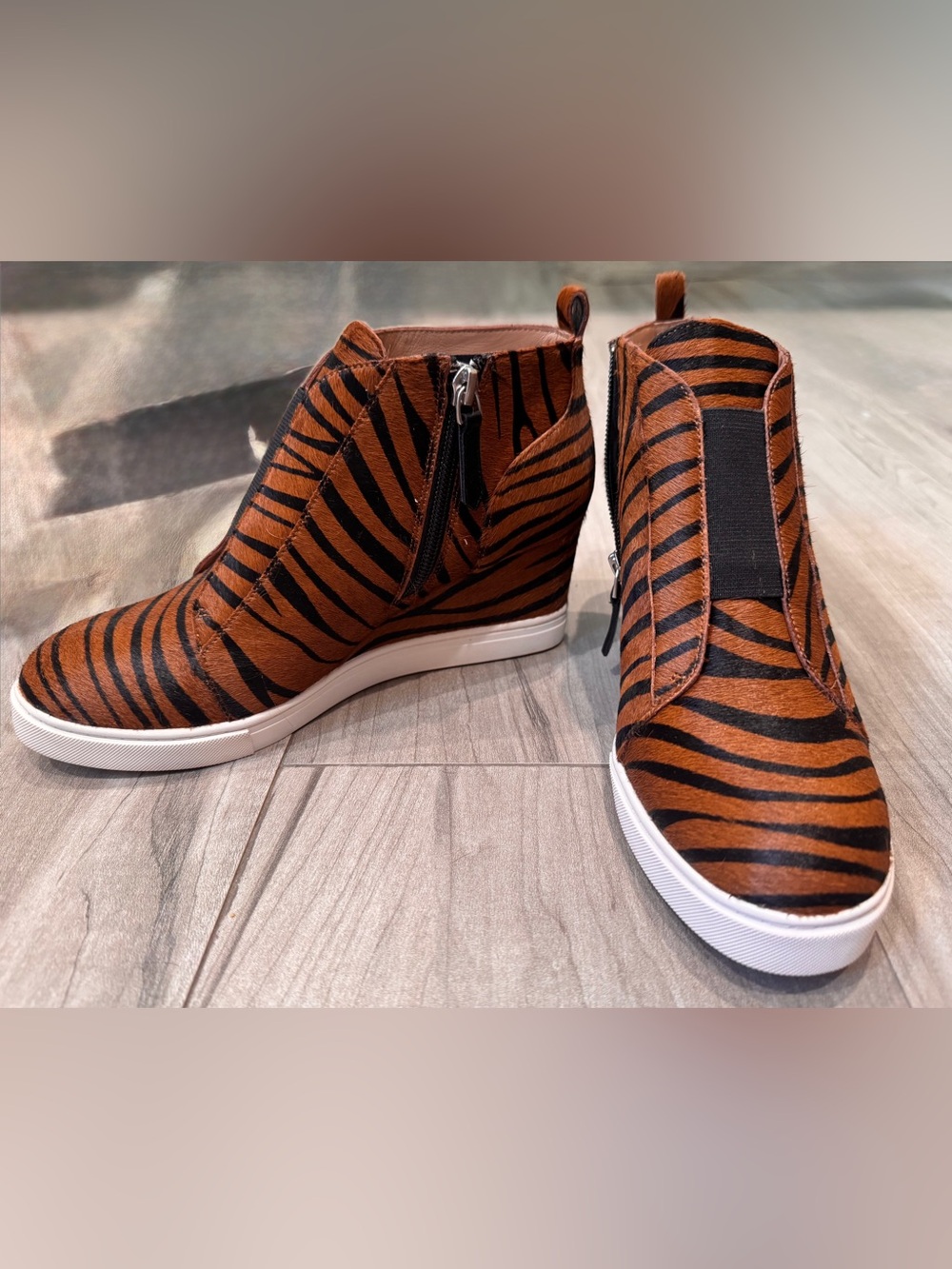 LINEA PAOLO: 7.5M
Felicia III Leather Zebra Print Hidden Wedge Booties - NEW!